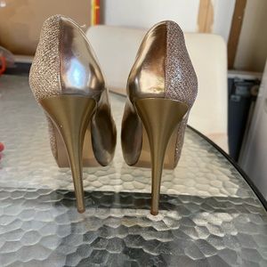 Gold stiletto heels